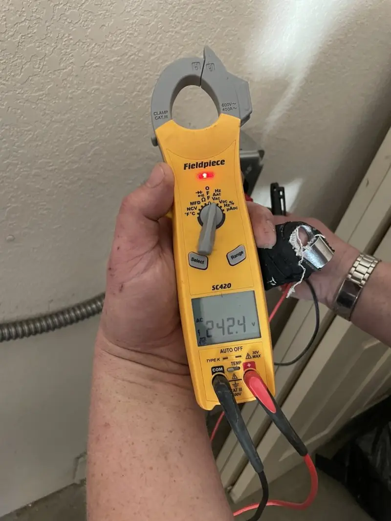 Voltage testing with clamp meter during Hot Tub / Pool Electrical Wiring in Bedford